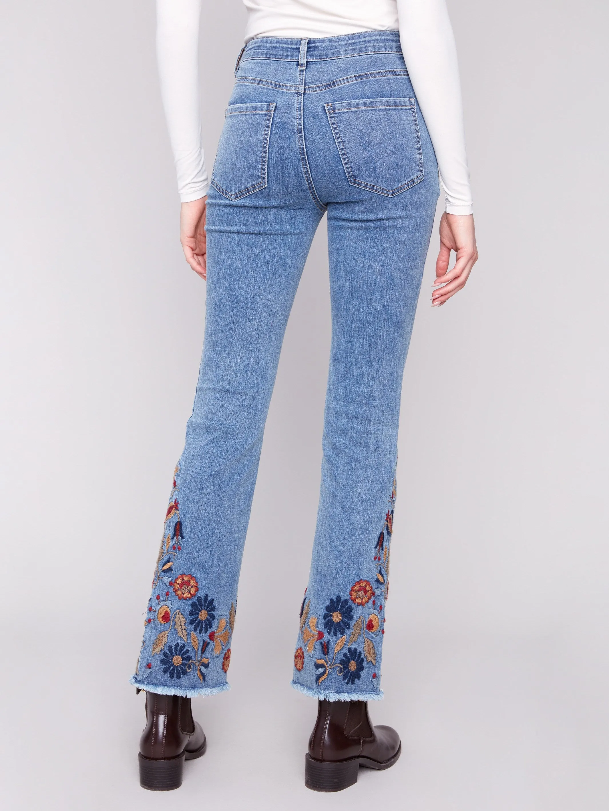 Weekend Warrior Earthy Lightwear Option Flare Leg Jeans With Colorful Floral Embroidery - Medium Blue