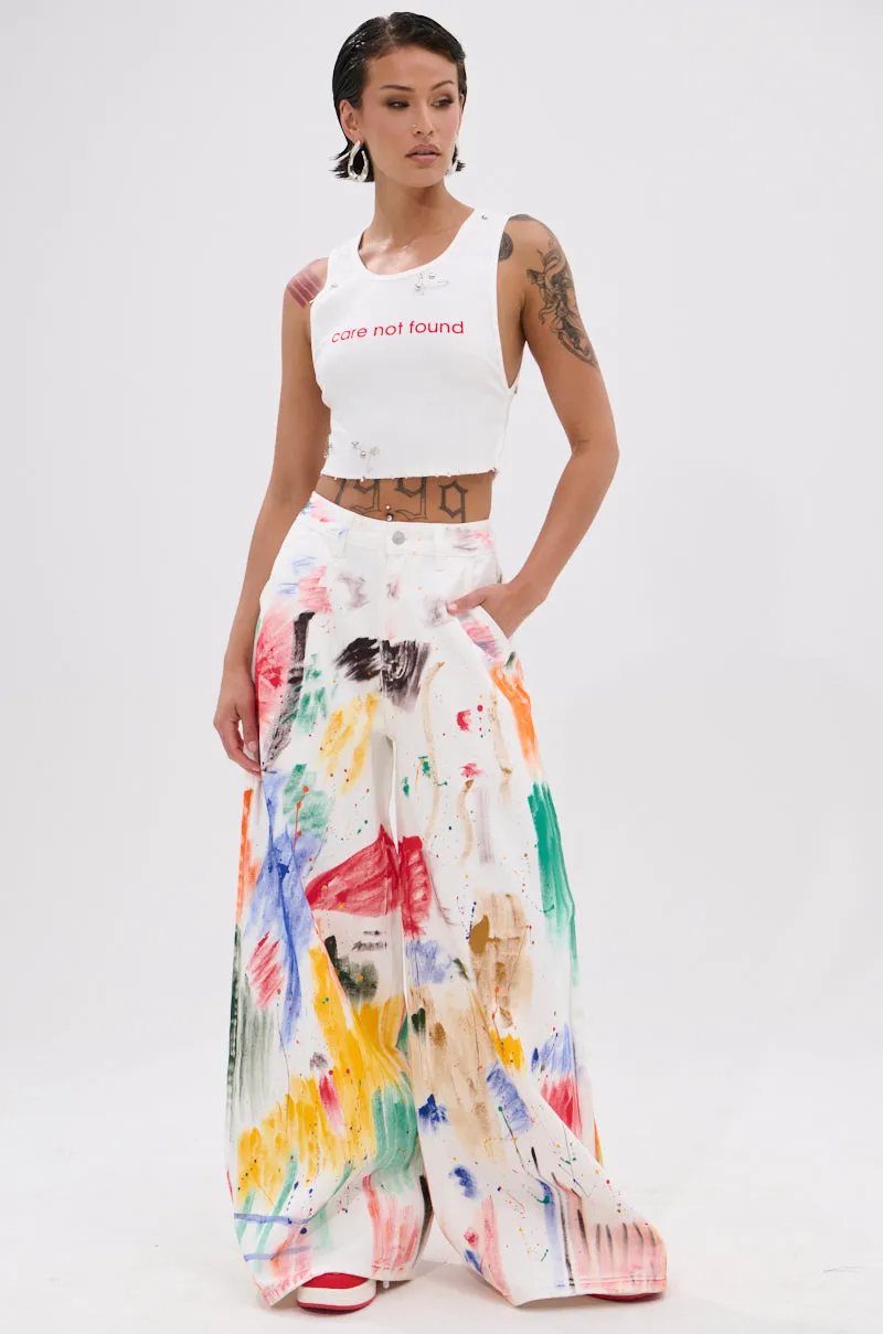 Revolutionary NEVER CARED DISTRESSED CROPPED TANK TOP