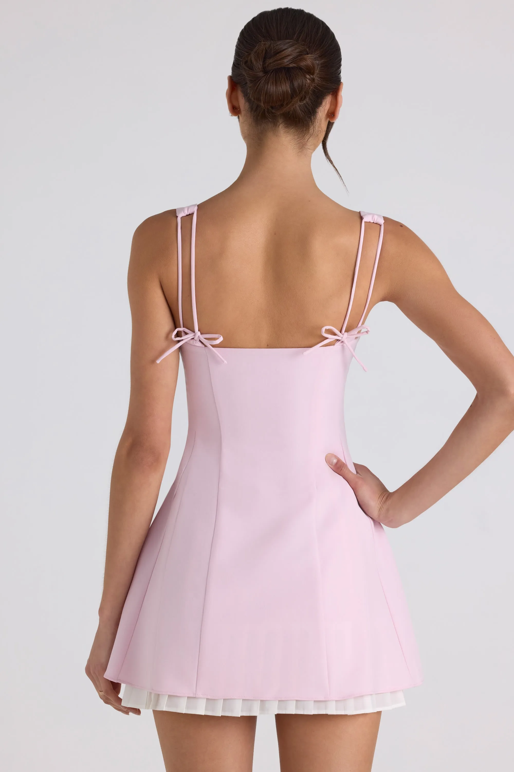 Bow-Detail Pleated A-Line Mini Dress in Soft Pink Fishtail Hem Finish