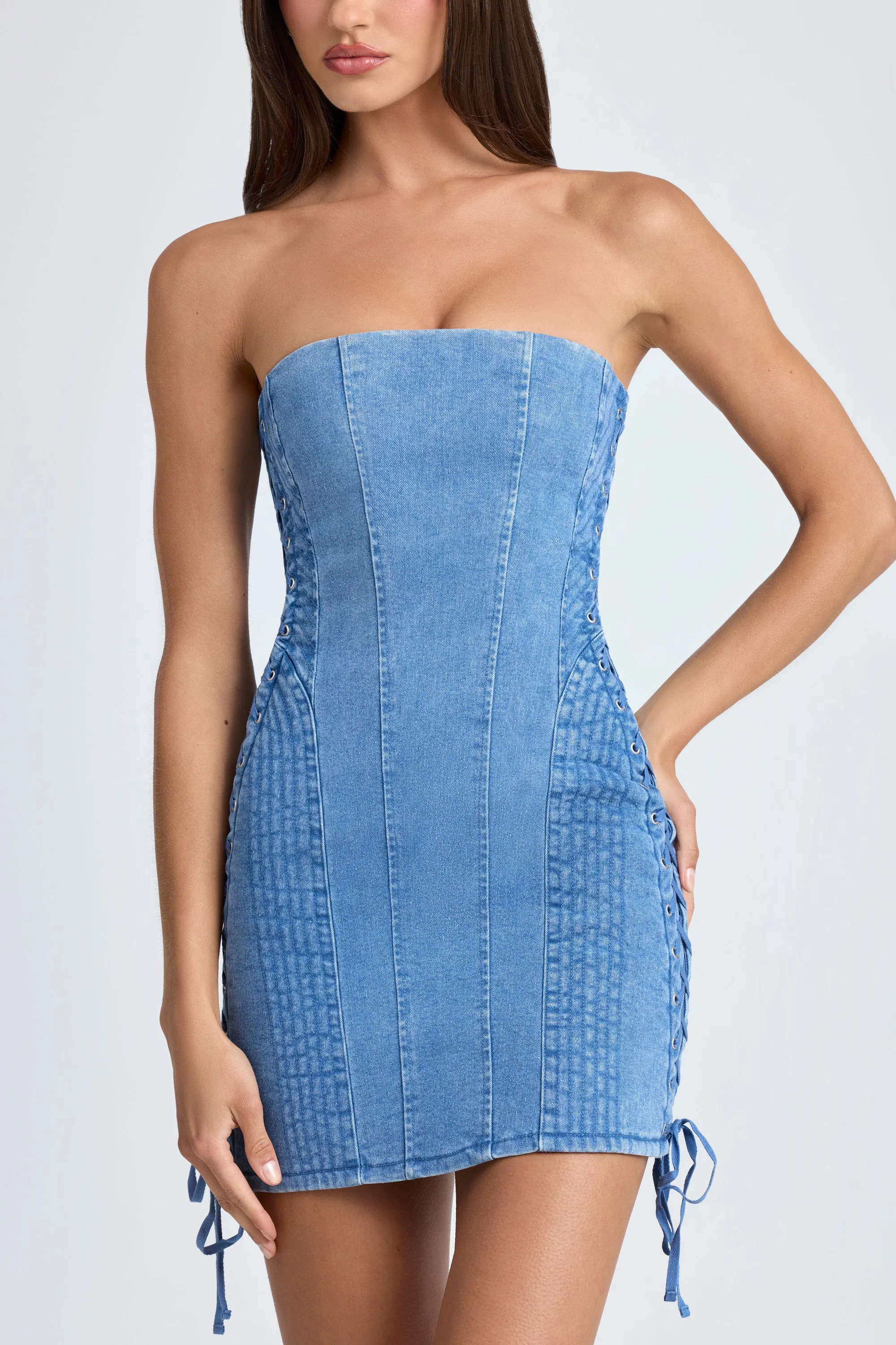 Bandeau Lace-Up Mini Dress in Mid Blue Stonewash Layered silhouette