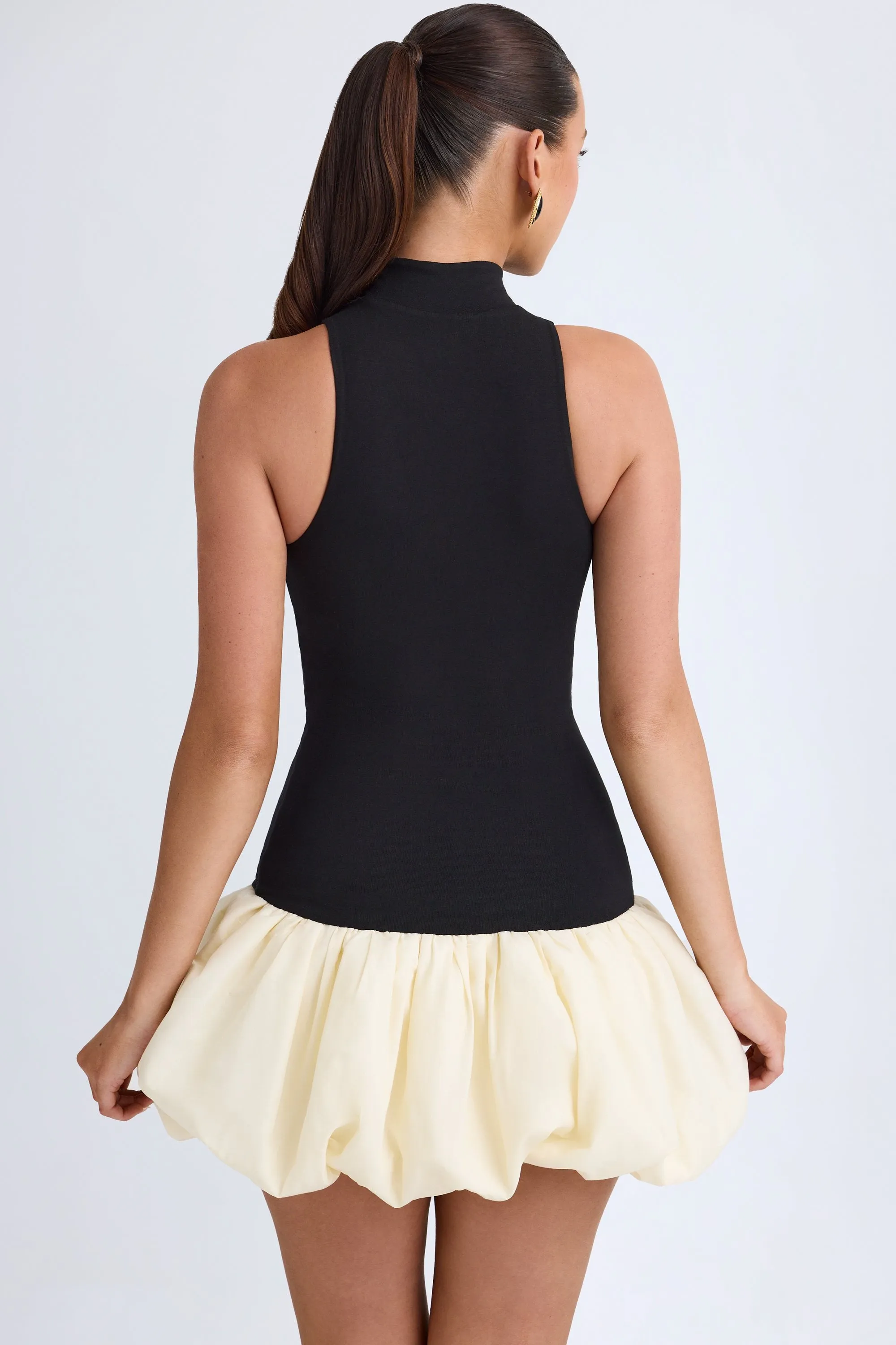 Turtleneck Drop-Waist Bubble Hem Mini Dress in Black Double Layered Hem