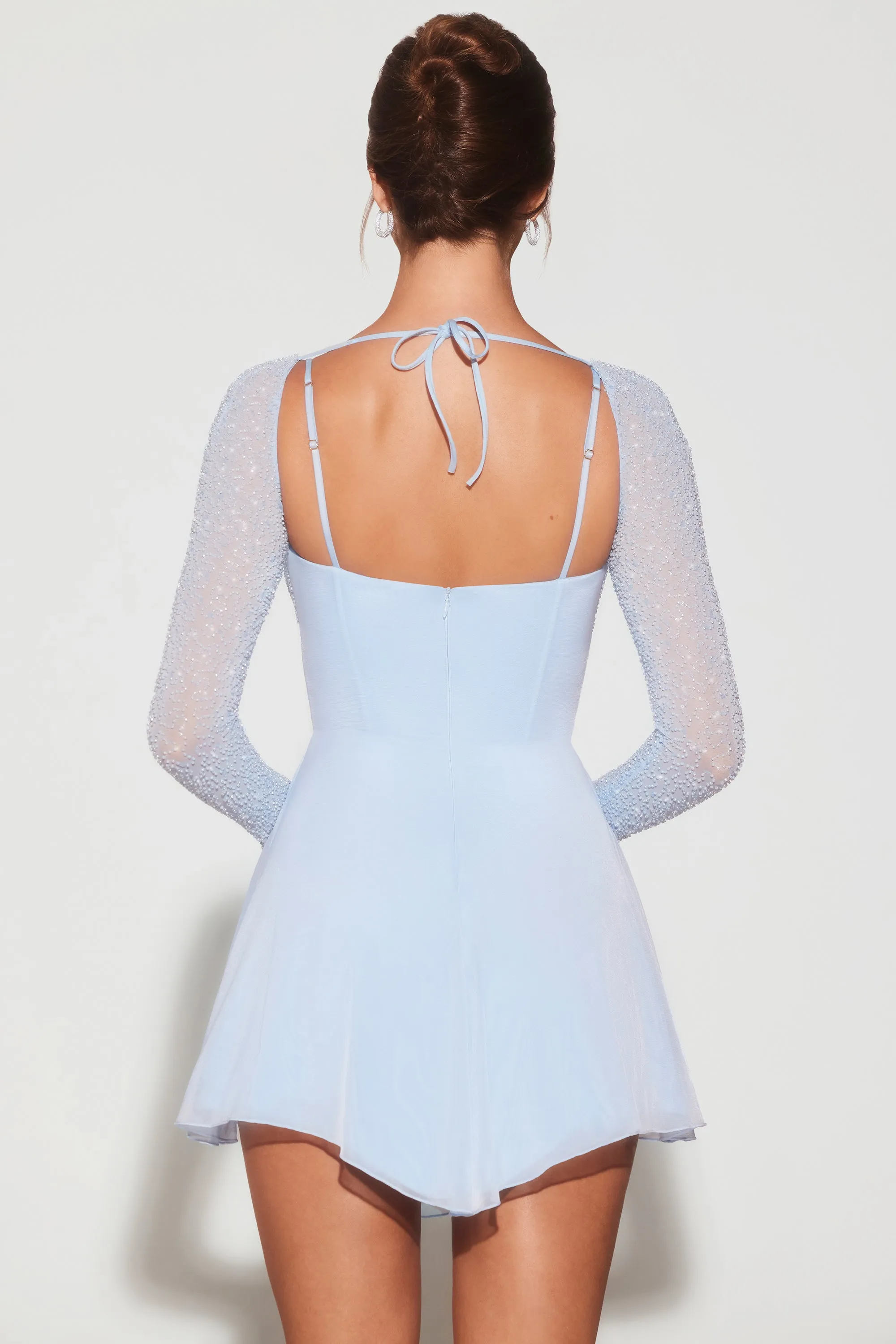 City Star Embellished Long Sleeve Angled Hem Mini Dress in Blue