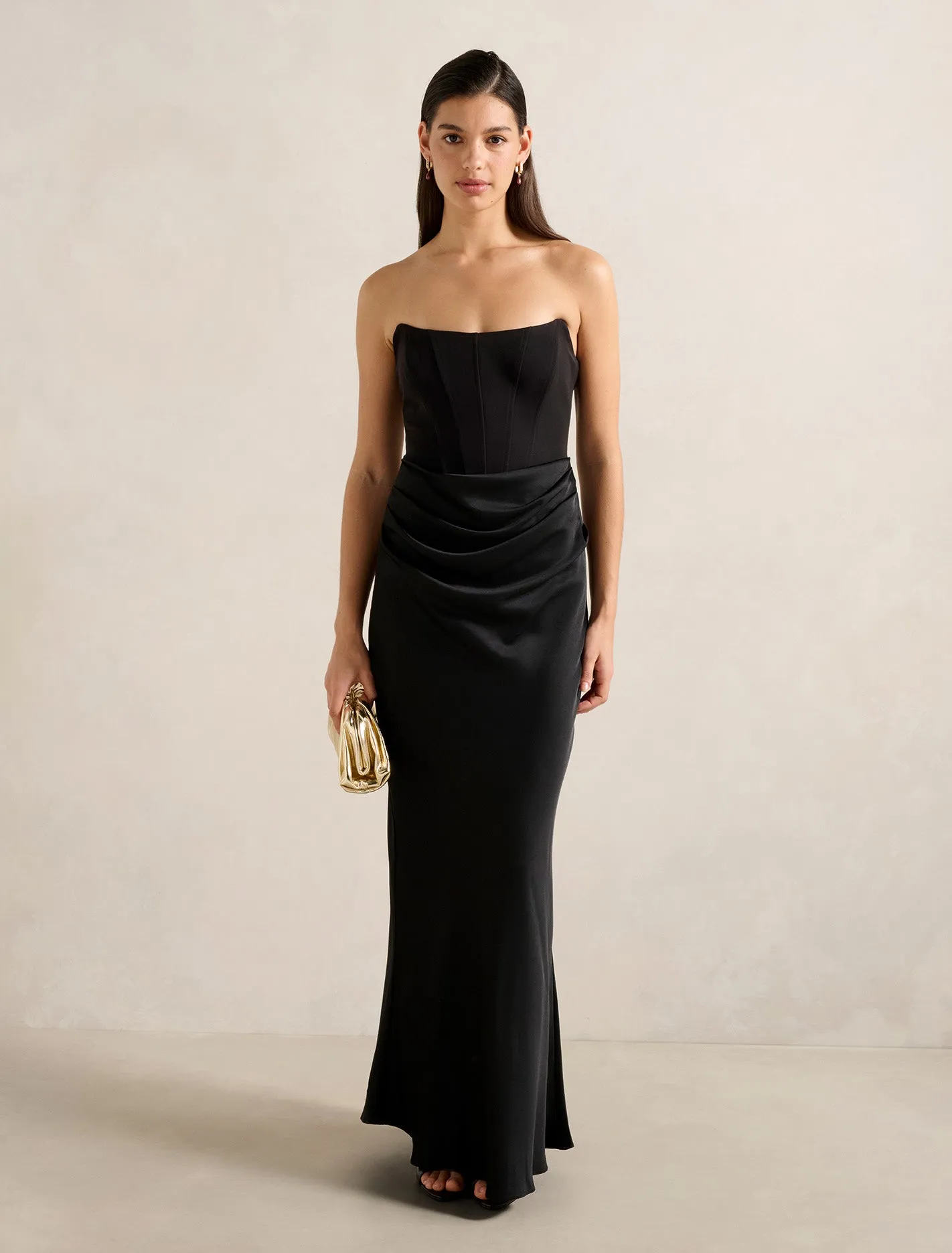 Isra Drape Strapless Maxi Dress The dress??s simple design allows you to dress it up or down depending on your style