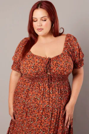 The soft fabric of this dress ensures all-day comfort without compromising on style Brown Boho Maxi Dress Short Sleeve Cut Out Tiered