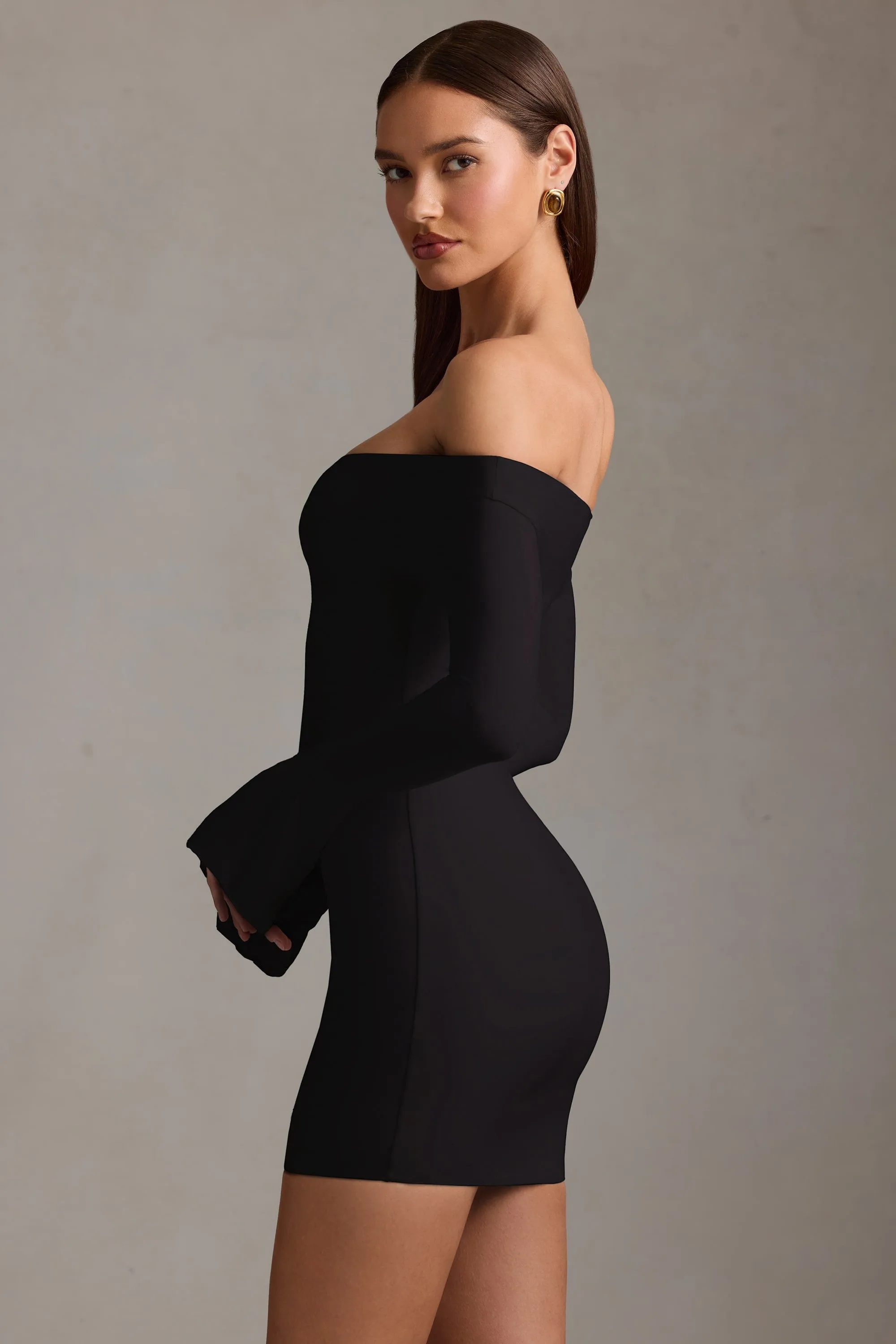 Off-Shoulder Cut-Out Mini Dress in Black Stage Glow