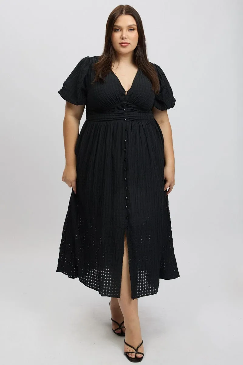 This dress is designed to provide both comfort and style making it the perfect choice for any occasion Rose Glow Black Midi Dress Short Sleeve V-Neck Window Check