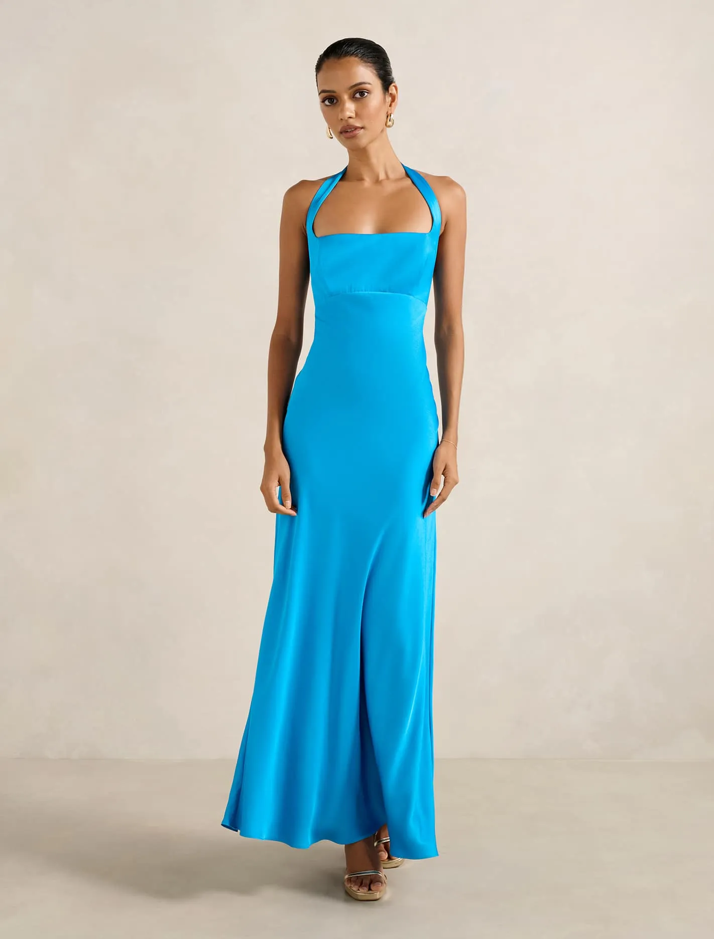 Straight Line The sleek lines of this maxi dress create a flattering and elegant look for any event April Petite Open Back Maxi Dress