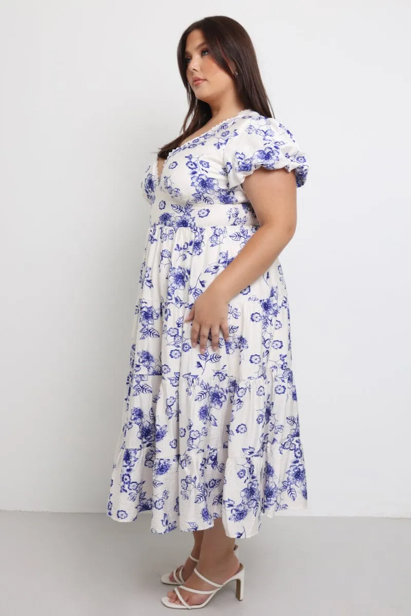 Blue Floral Maxi Dress Short Sleeve V Neck Tiered This maxi dress combines a relaxed fit with an elegant look for a versatile wardrobe piece
