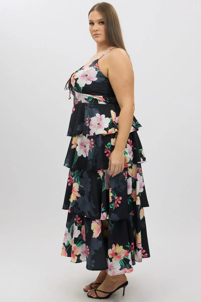 The flattering cut of this dress creates a polished appearance without being overly fussy Town Lane Black Floral Maxi Dress Sleeveless Ruched Bust Tiered