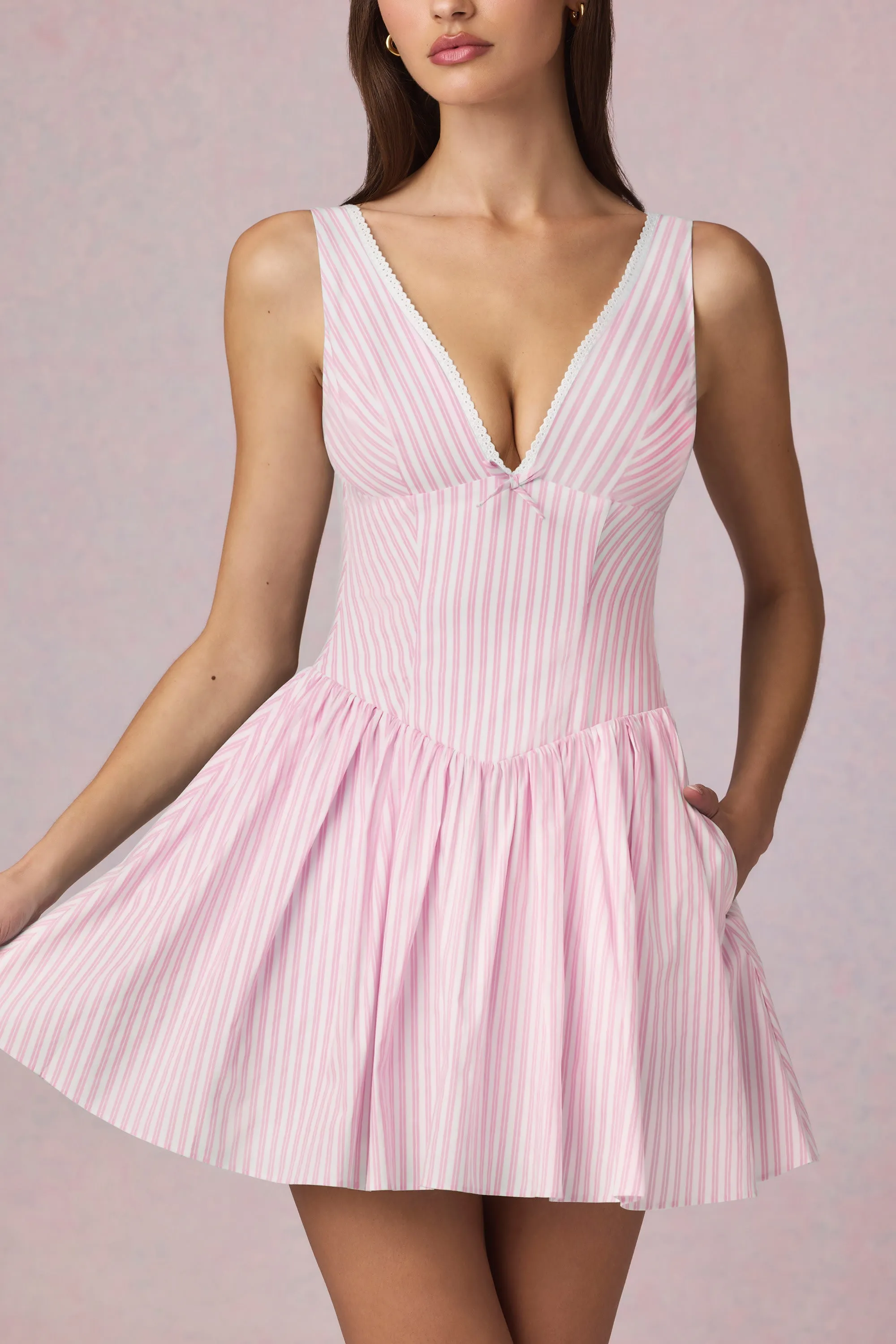 Trend Edge Bow-Detail A-Line Mini Dress in Soft Mauve Stripe