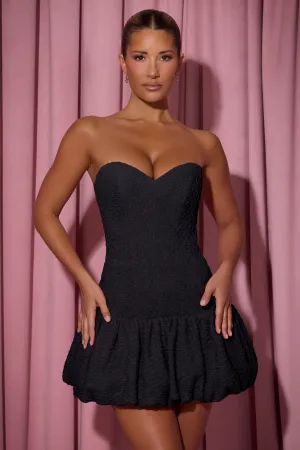 Cut-Out Bubble Hem Corset Mini Dress in Black Glow Hot Convertible Neckline