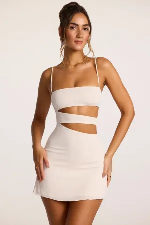 Vibrant Fashion City Chic Textured Jersey Cut-Out A-Line Mini Dress in Ivory
