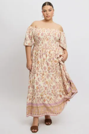 Beige Boho Maxi Dress Short Sleeve Shirred This dress is designed to provide both comfort and style making it the perfect choice for any occasion
