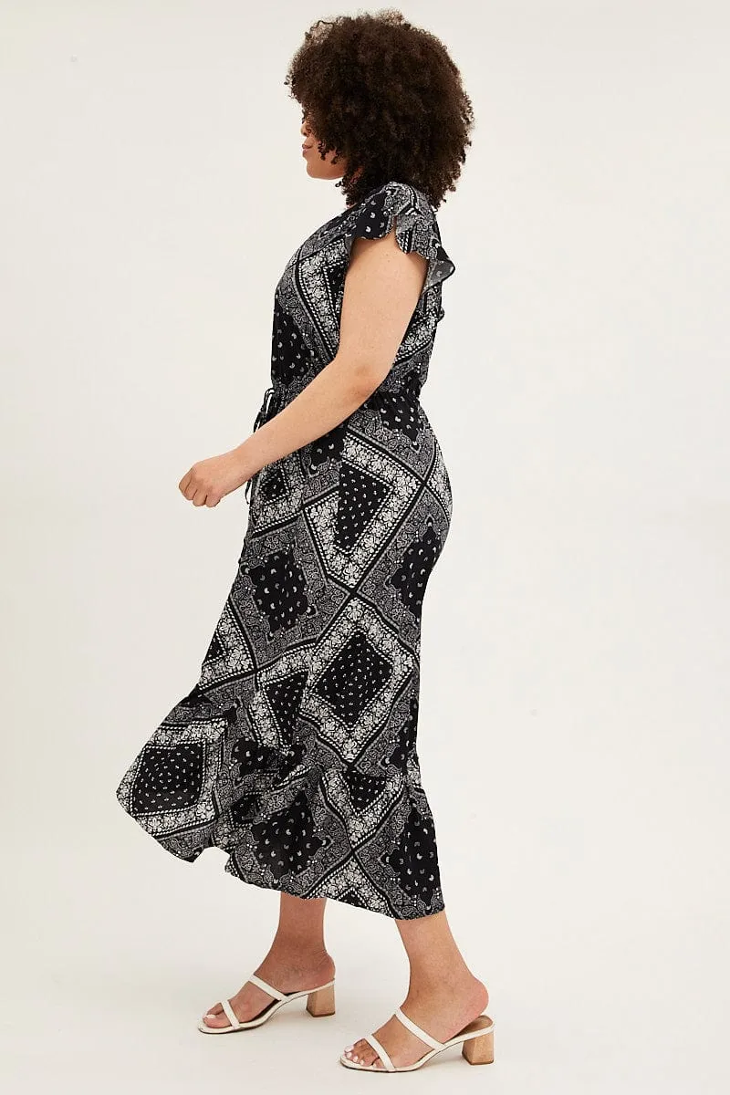 With its soft fabric and elegant cut this dress is perfect for all-day wear Black Boho Maxi Dress Bandana Button Front High Low