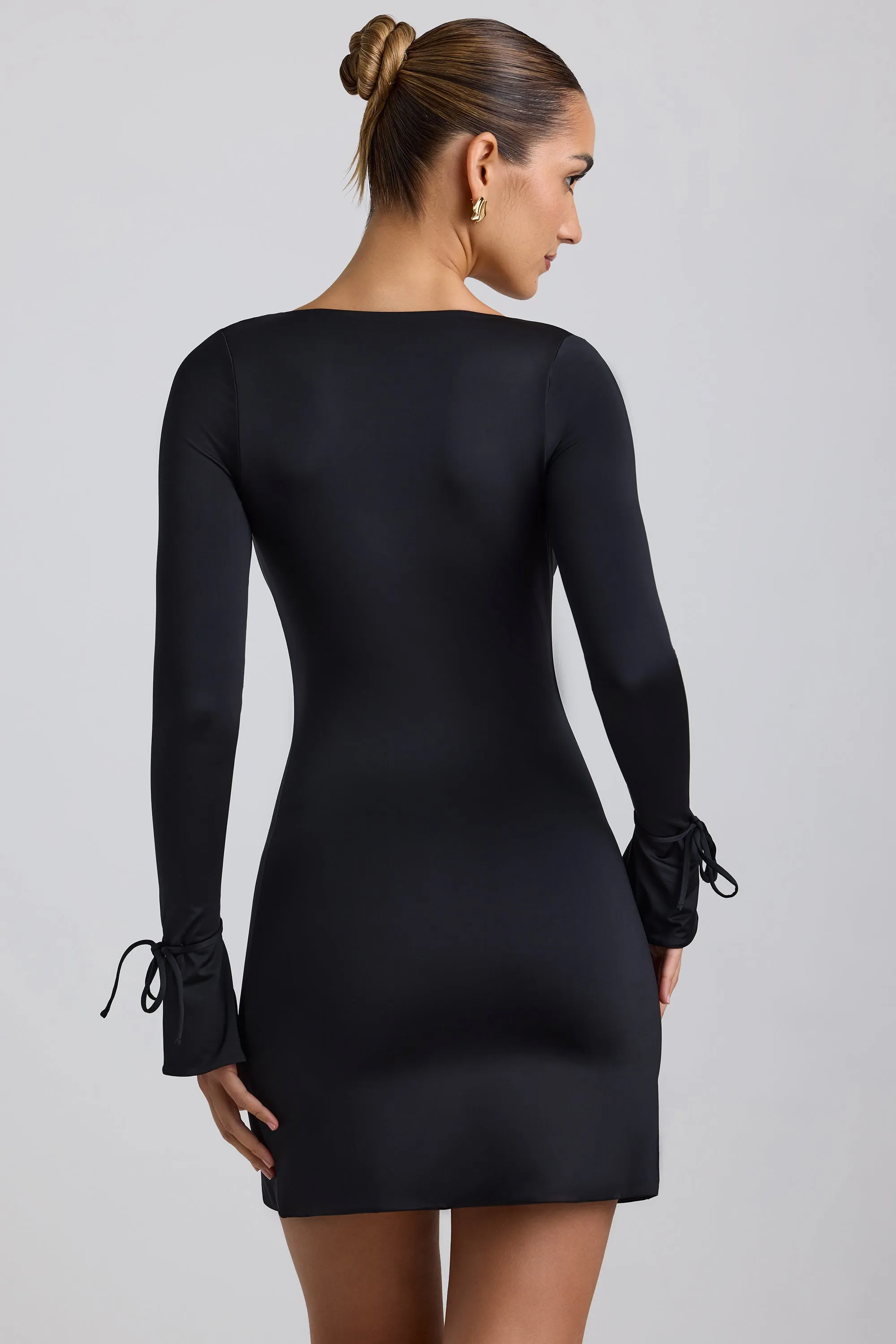 Show Skin Modern and sleek mini Slinky Jersey A-Line Mini Dress in Black