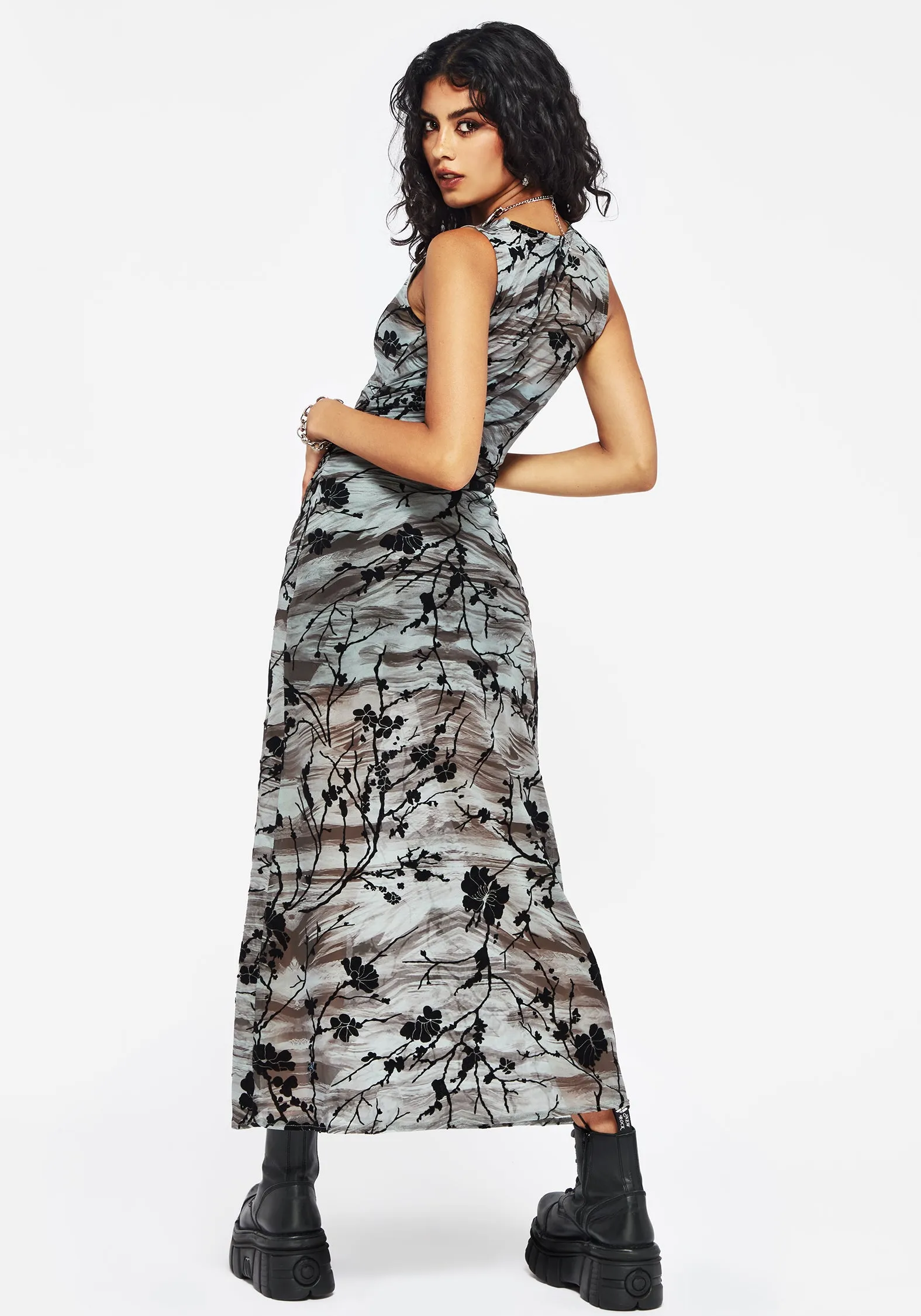 With a flowy skirt and a structured top this maxi dress offers a perfect balance of comfort and style Voile Glow Wytchelm Sleeveless Flocked Midaxi Dress - Blue