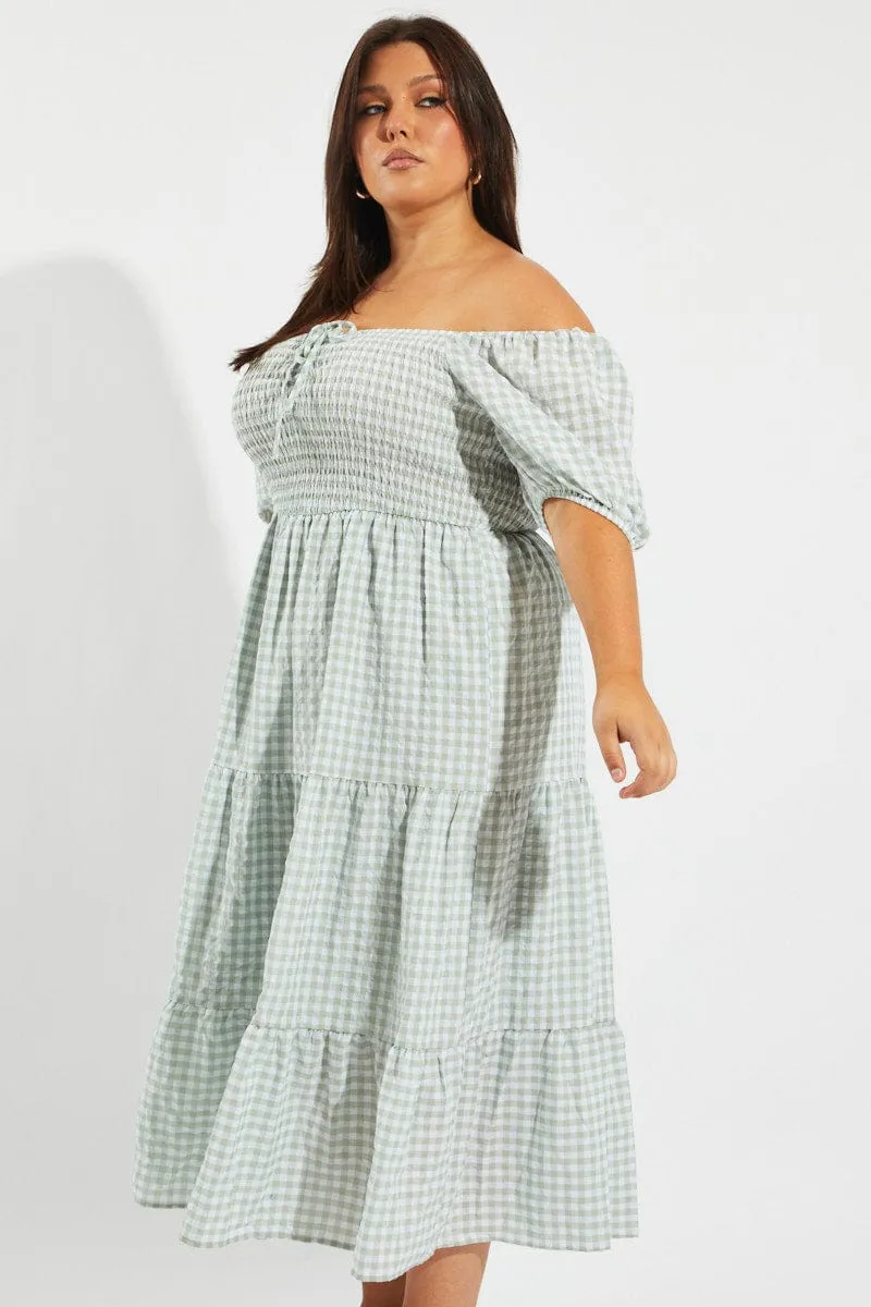 Green Check Maxi Dress Short Sleeve Shirred This dress offers a comfortable and elegant fit that works for both casual and formal events