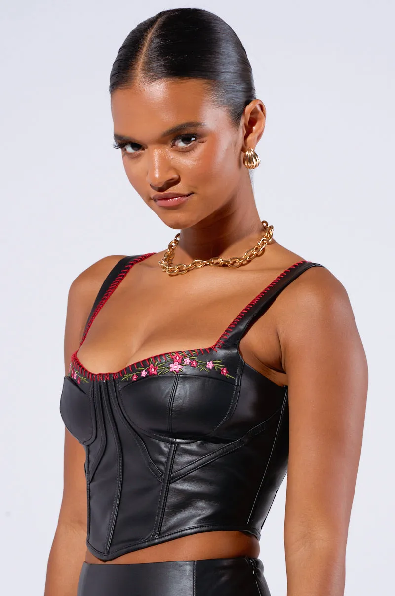 BACK IT UP EMBROIDERED CORSET advertising campaign Performance Improvement
