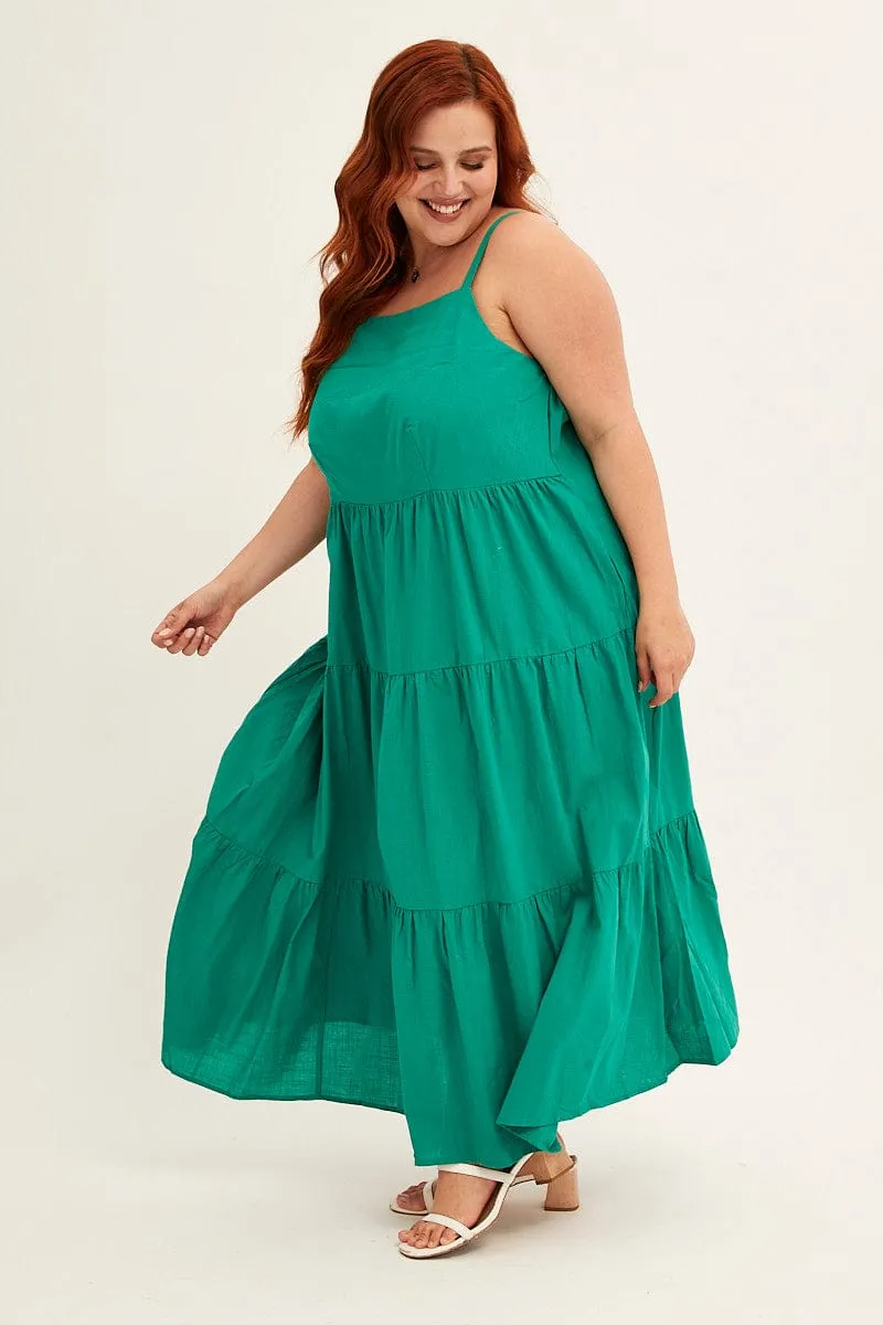 The lightweight fabric of this dress ensures comfort throughout the day without compromising style Green Sleeveless Cotton Maxi Dress With Pockets