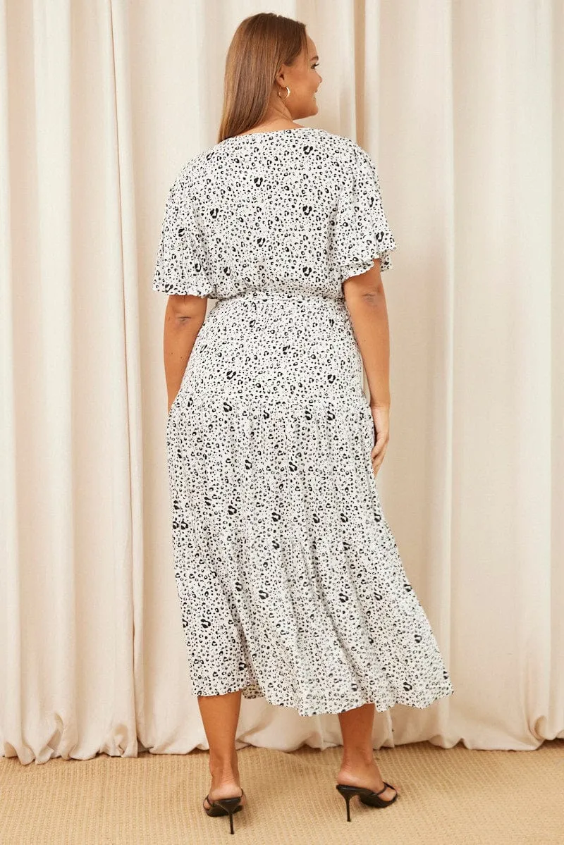 White Animal Print Maxi Dress Short Sleeve Wrap Front Tiered Designed to suit all body types this dress provides a flattering fit for every figure