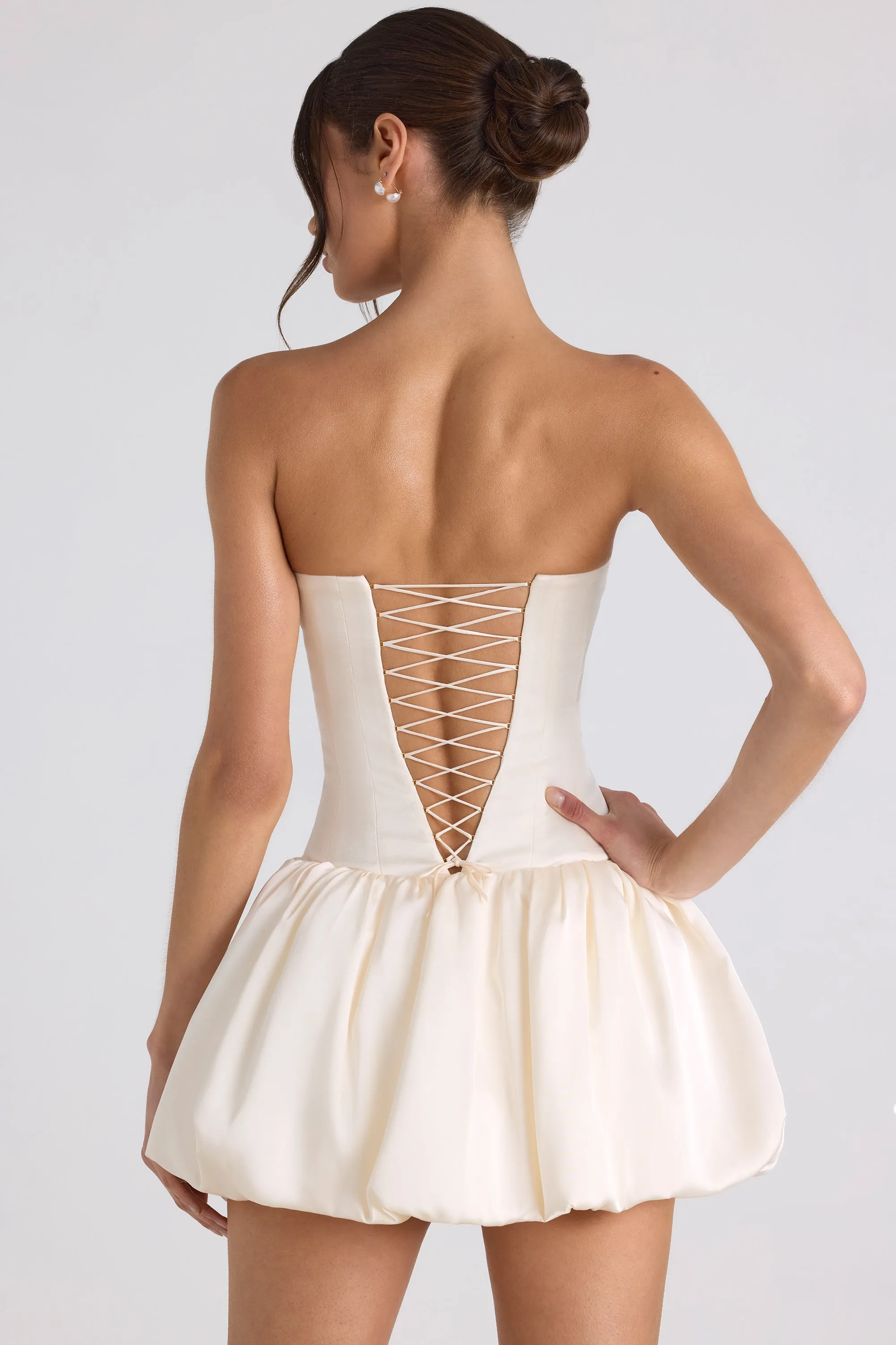 Stylish Appeal Lace-Up Bubble Hem Corset Mini Dress in Ivory