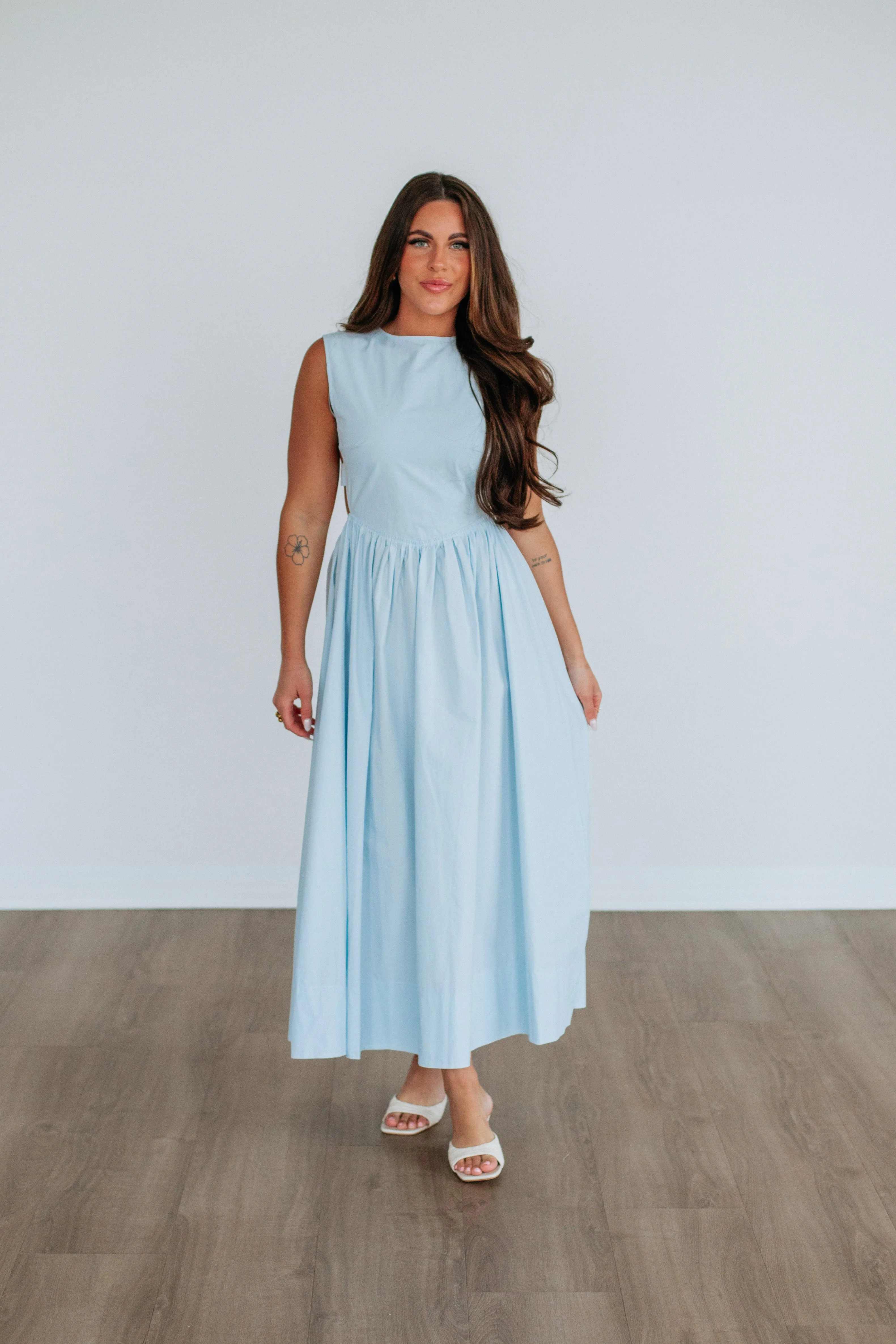 Alicyn Dress - Powder Blue The simple silhouette of this dress makes it easy to style for both day and night wear
