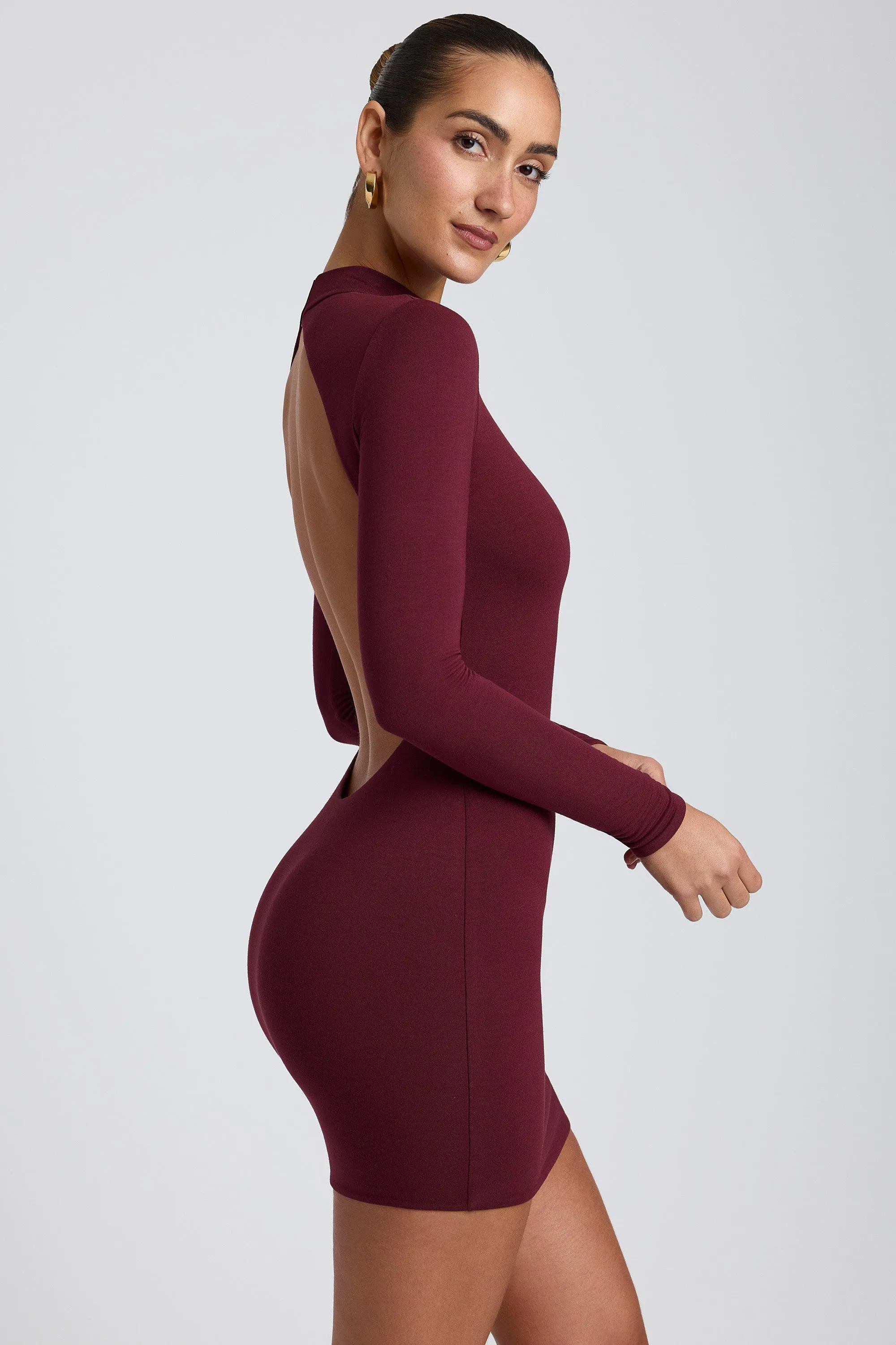 Confident Wear Stage Mode Modal Open-Back Long-Sleeve Mini Dress in Plum